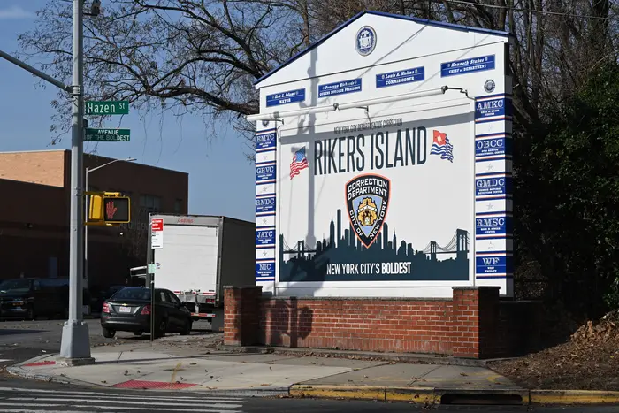 Signage at the entrance to Rikers Island.